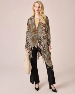 Outlet Poncho mit Quasten Strickware